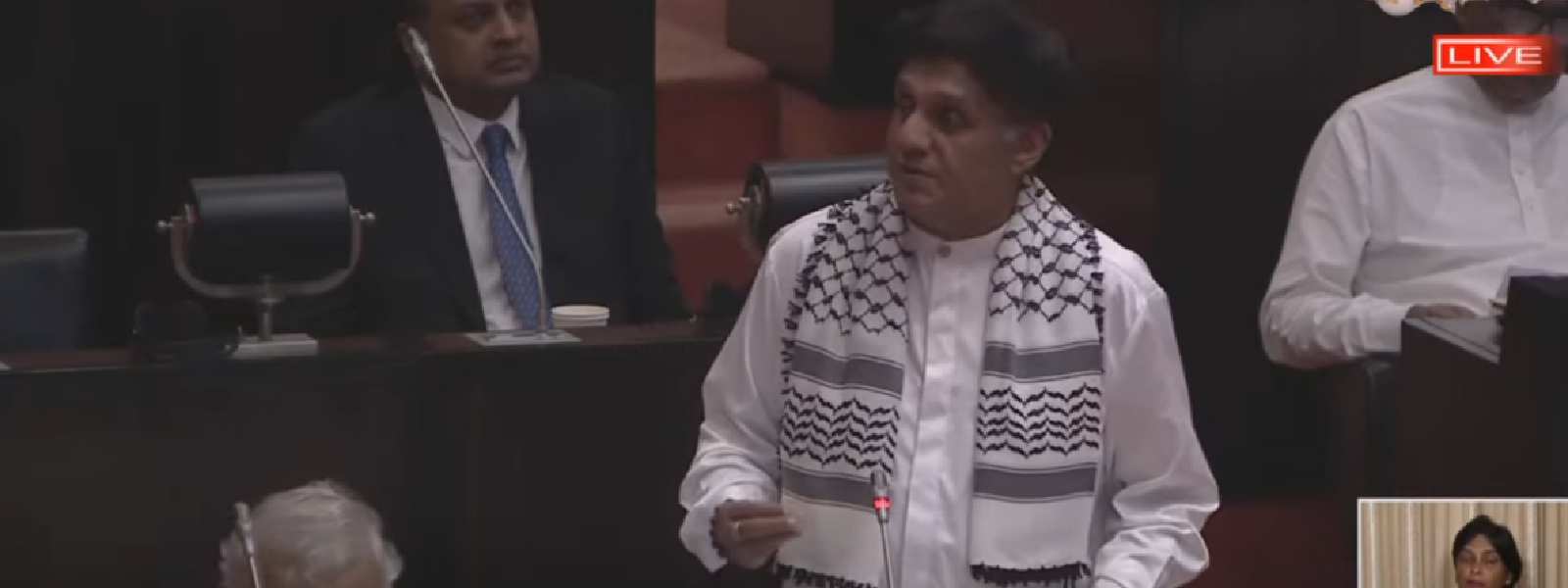 Sajith wears a Palestinian scarf to parliament